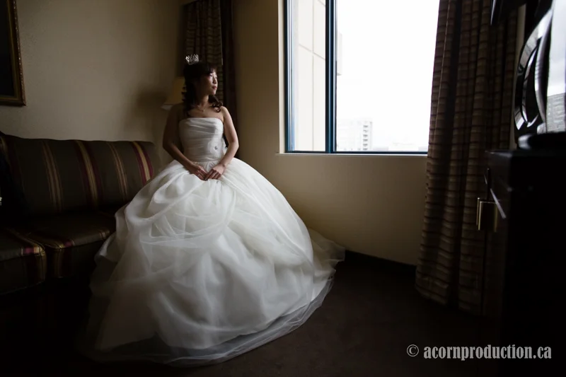 06-bride-sitting-by-window
