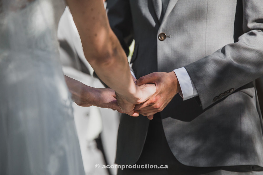 toronto-granite-brewery-wedding-cermony-holding-hands.jpg