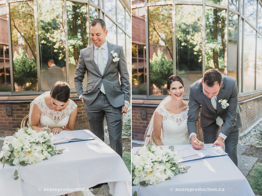 toronto-granite-brewery-wedding-bride-and-groom-signing-marriage-license.jpg