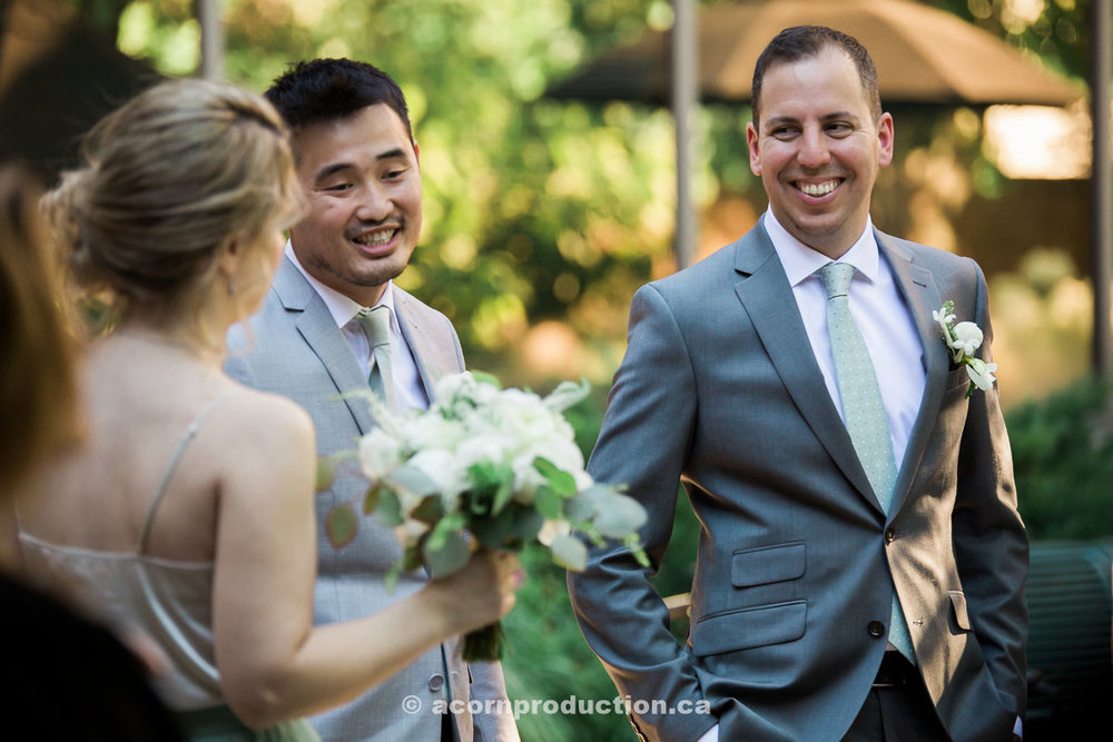 groom-chatting-with-wedding-party.jpg