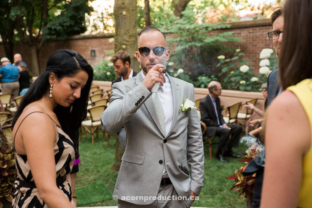 wedding-guest-smoking-cuban-cigar.jpg