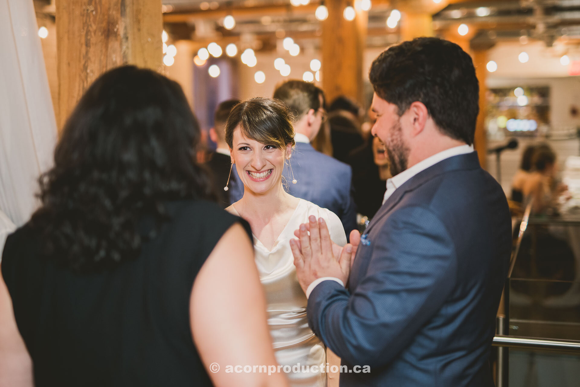 56-bride-chatting-with-wedding-guest-reception.jpg