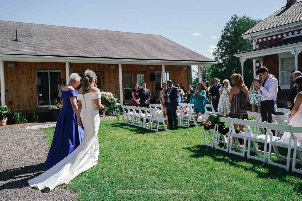 151-bride-and-mother-entering-wedding-ceremony-stouffville-museum.jpg