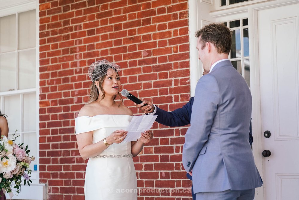 157-bride-speaking-on-her-vow-during-ceremony-stouffville-museum-wedding.jpg