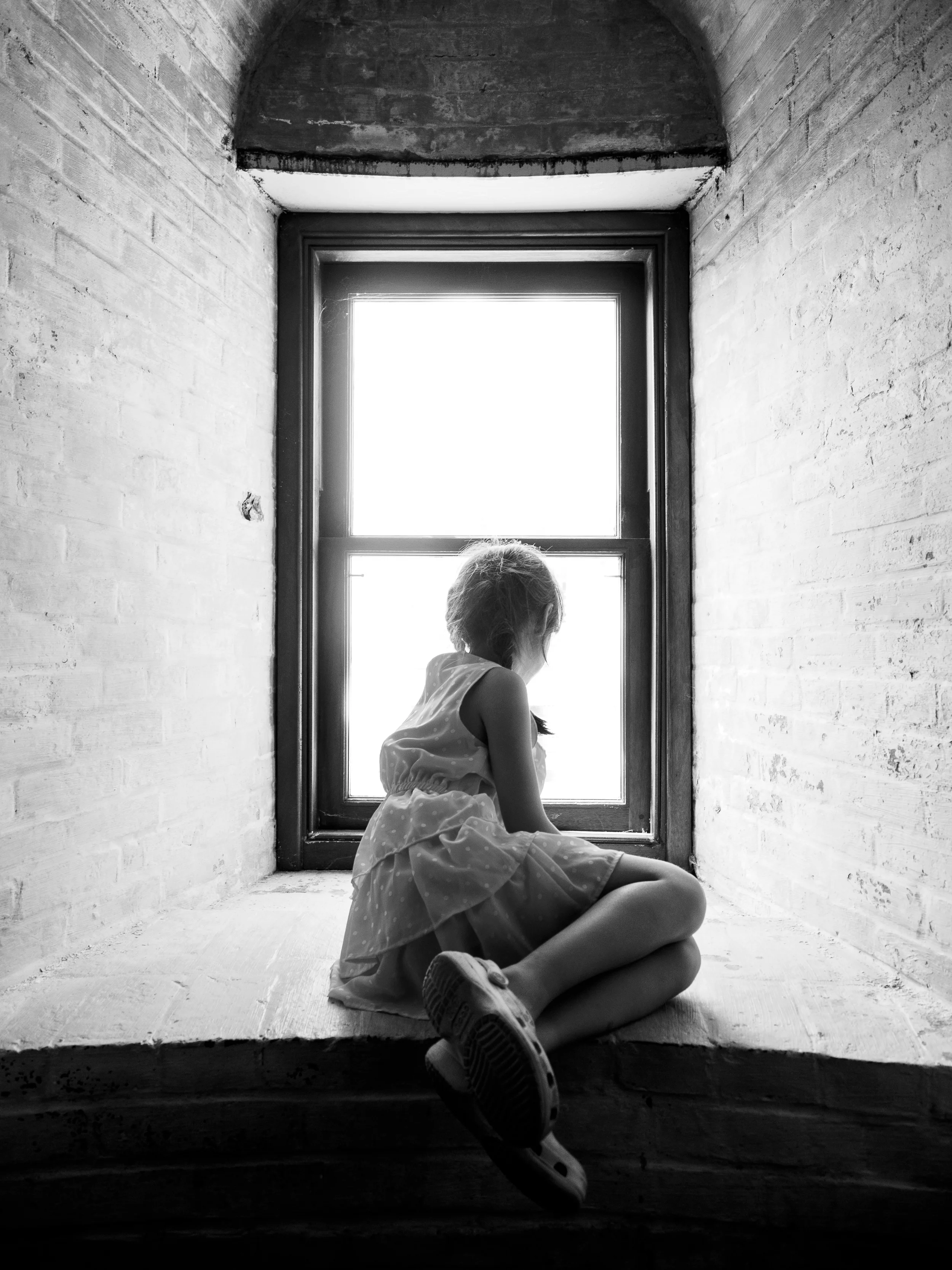 Alicia at one of the windows in the Absecon Lighthouse in Atlantic City