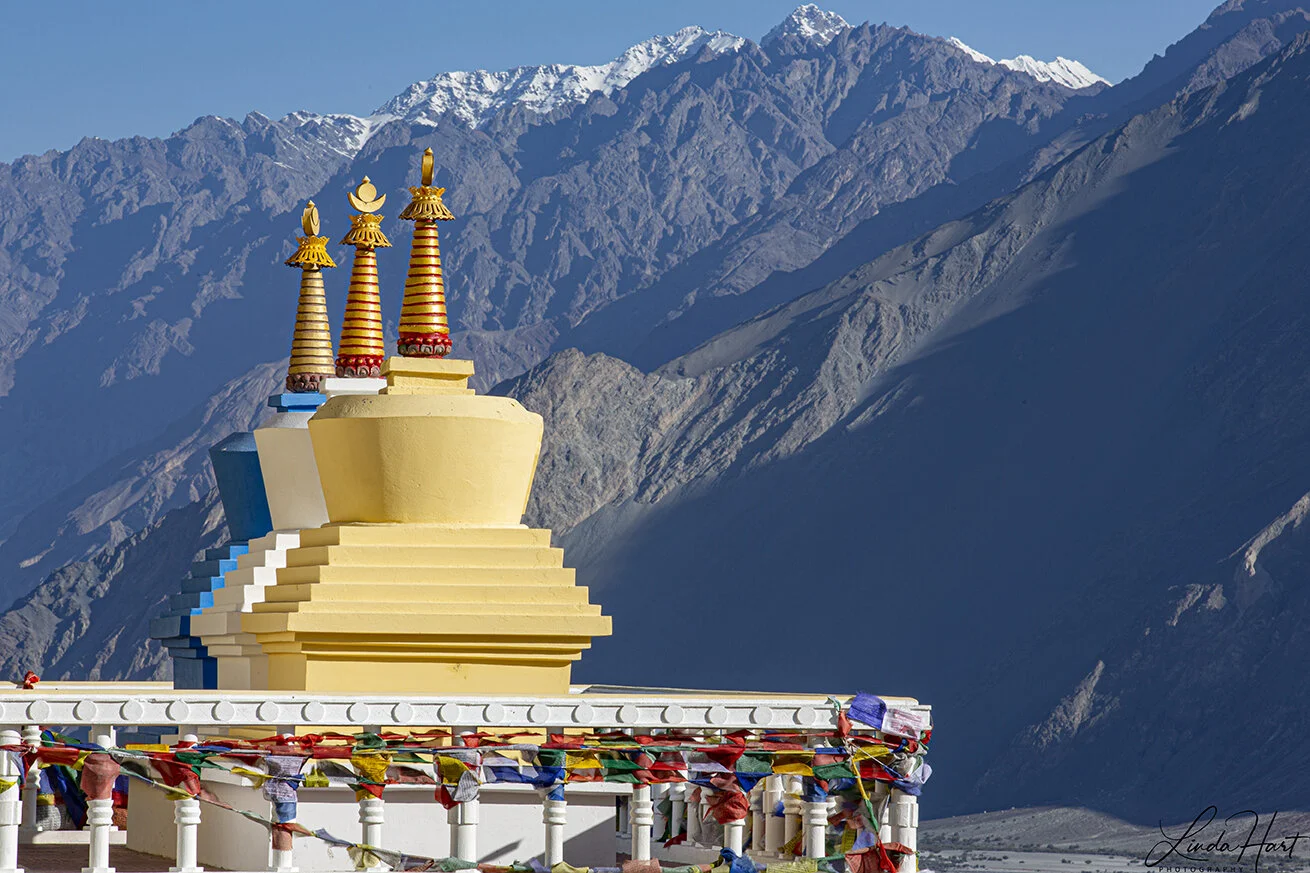 3 stupa -Mountains.jpg