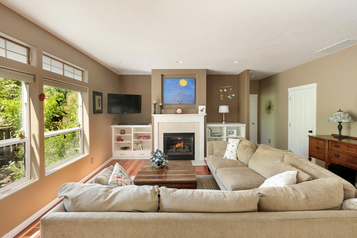 Custom built ins and a gas fireplace add extra character to the family room. And, did I mention the custom eucalyptus floors?