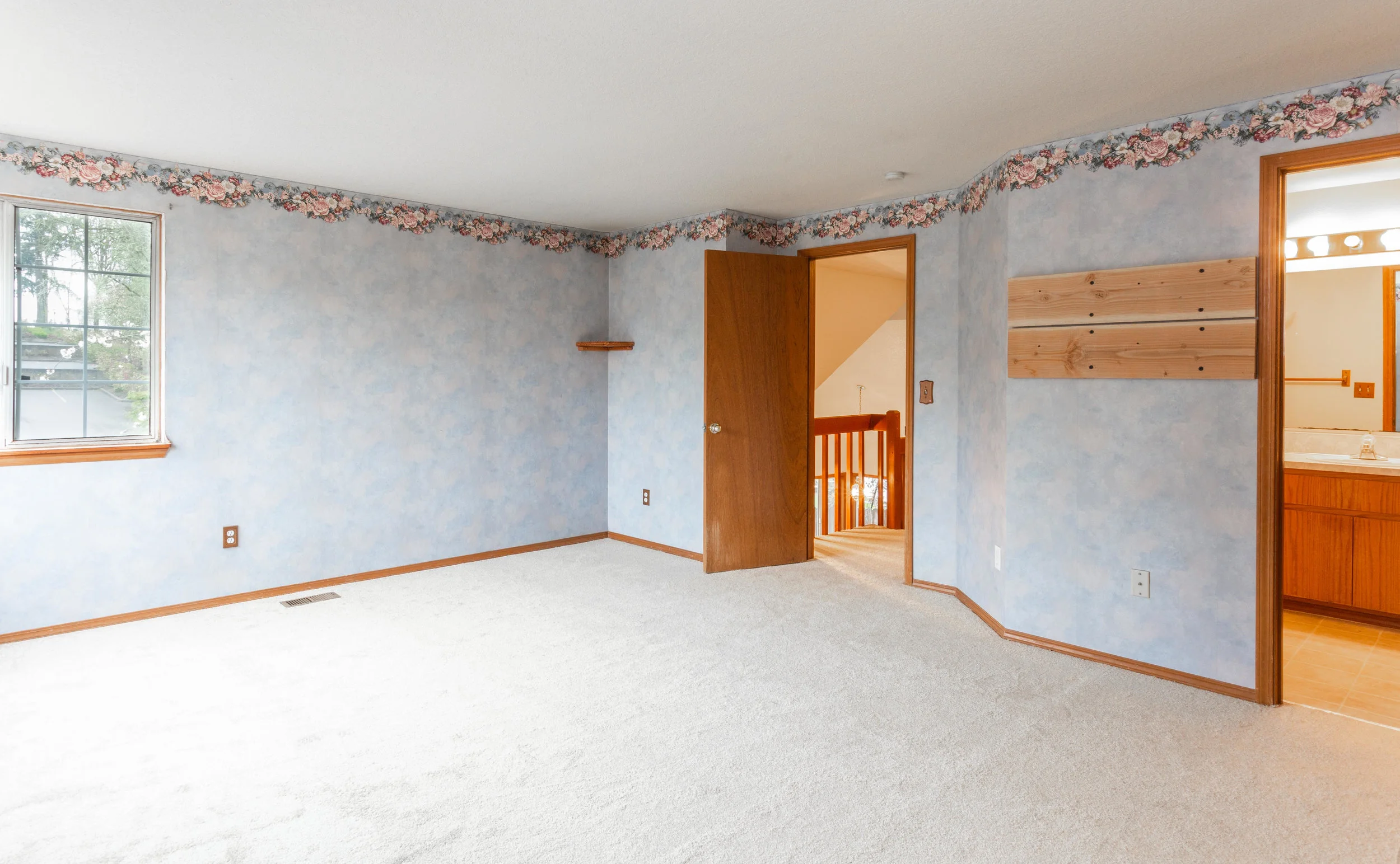Okay, so you may not love the wallpaper in the master suite, but you’ll want to redecorate this huge 17’x13’7” room to be your own private retreat anyway, right?