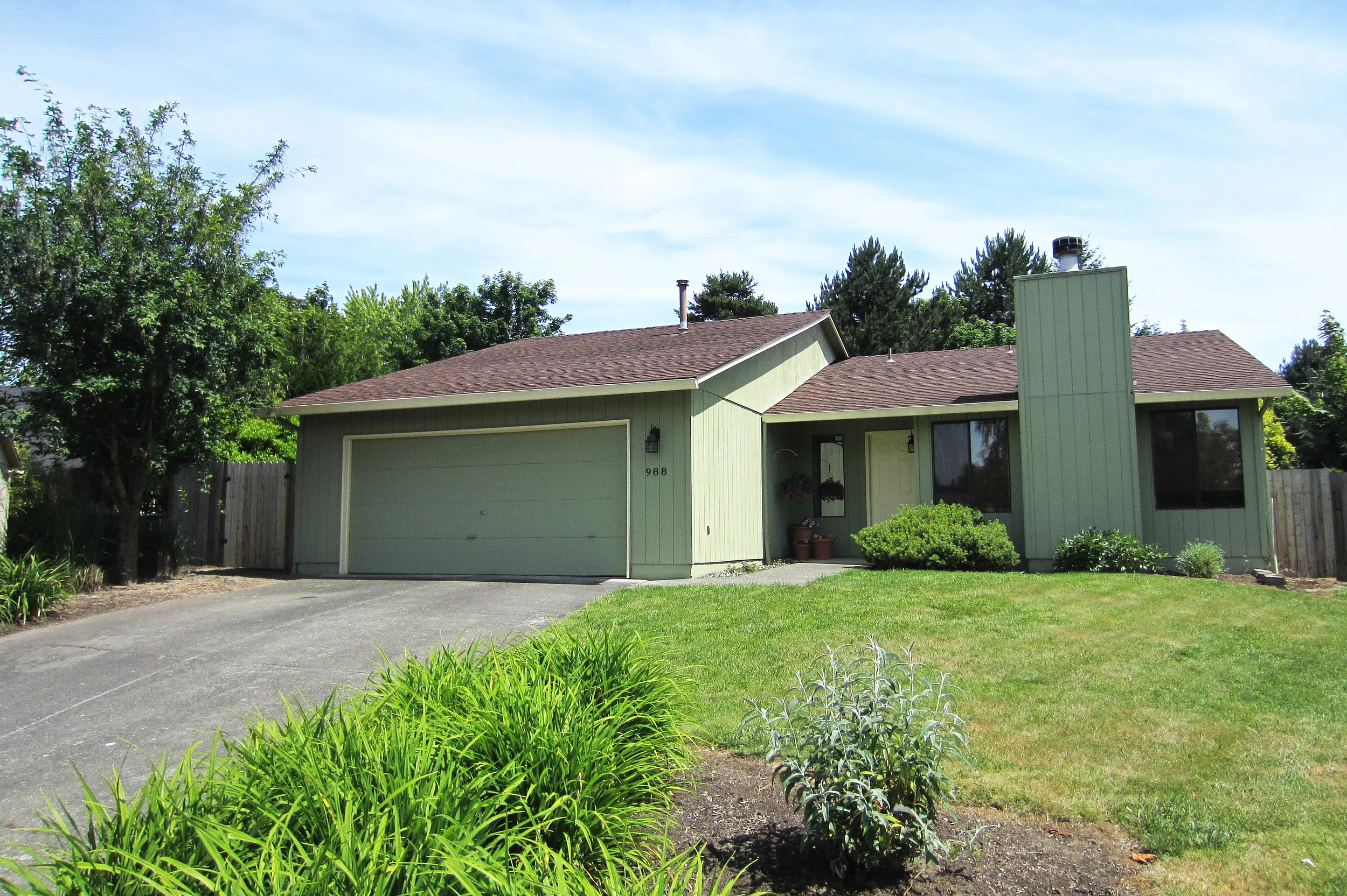 My starter home after we lived there for nearly 10 years, in all it’s sage green, T-111 siding awesomeness.