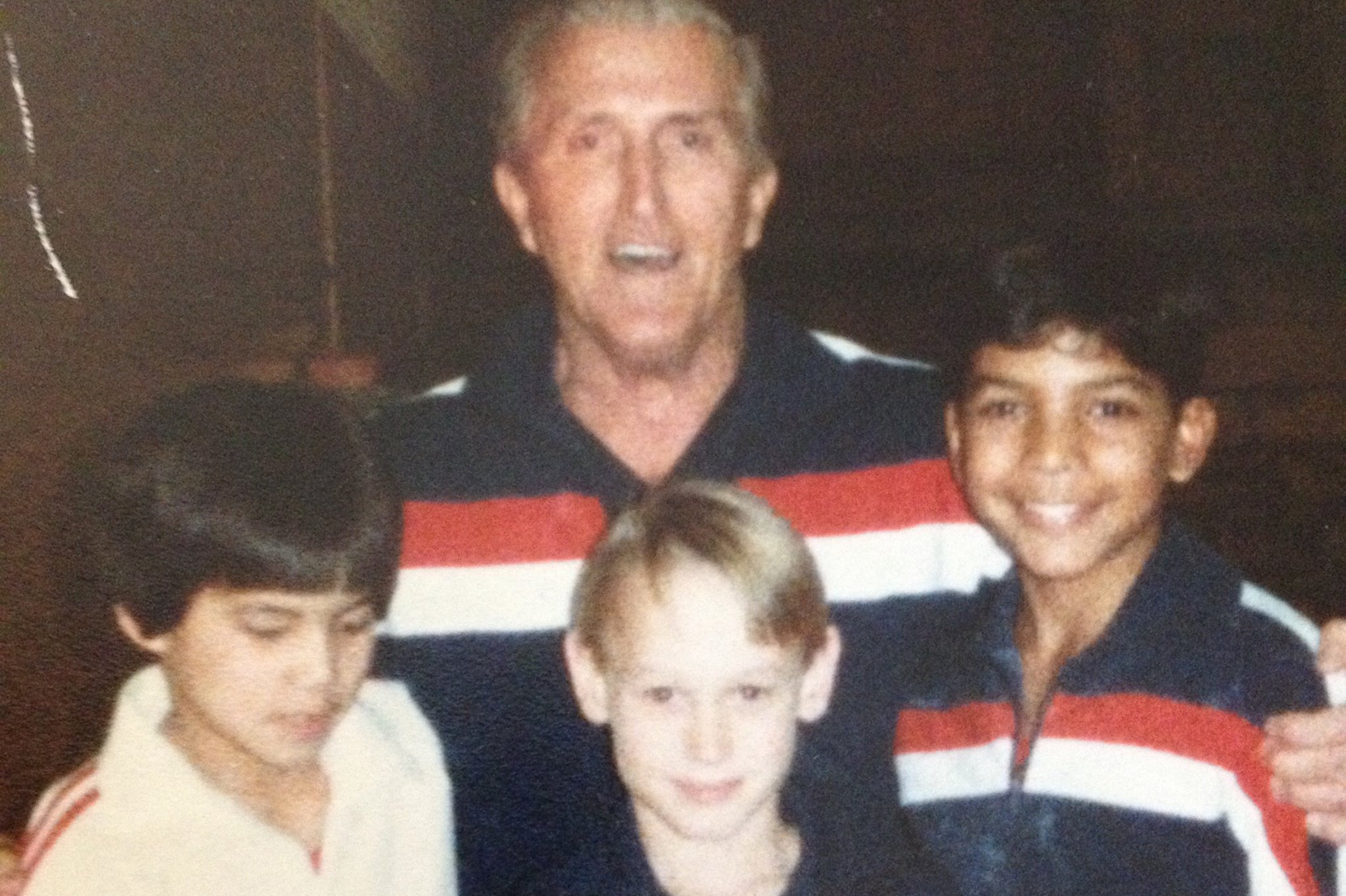 Far Right: Steve V. Rodriguez as a young gymnast with best in front, teammate and Coach Around 1982