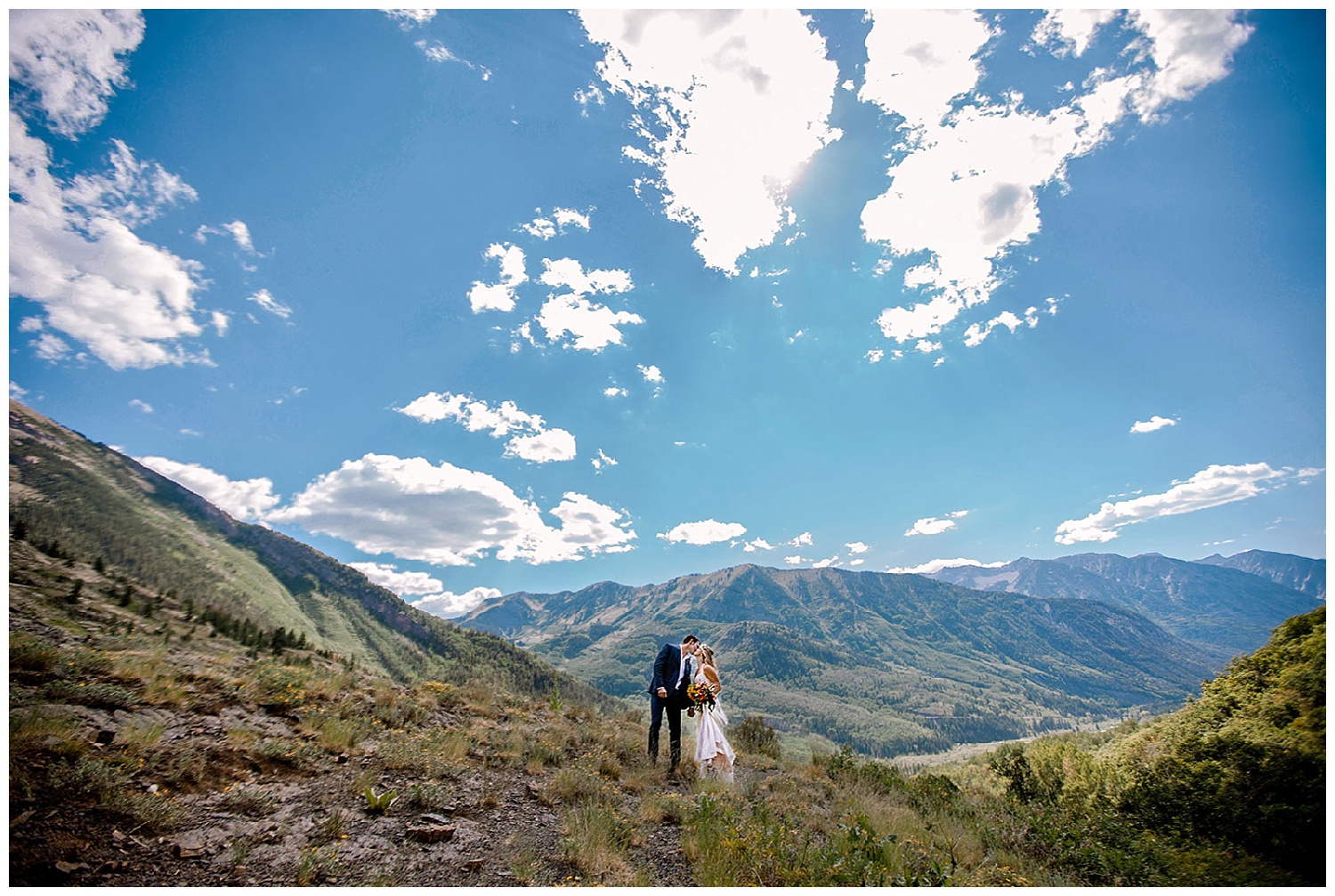 bride and groom hiking in the mountains, marble colorado wedding, maroon bells wilderness wedding, adventurous colorado wedding photographer, adventure wedding, marble lodge wedding