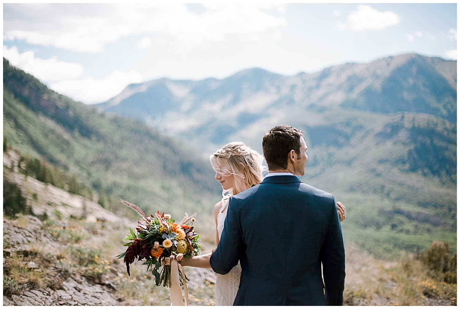 bride and groom hiking in the mountains, marble colorado wedding, maroon bells wilderness wedding, adventurous colorado wedding photographer, adventure wedding, marble lodge wedding