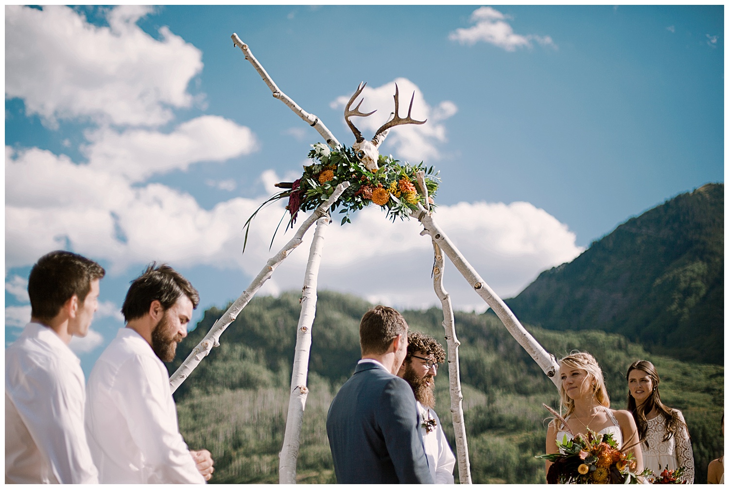 bride and groom at the alter, outdoor colorado wedding ceremony, marble lodge wedding, maroon bells wilderness wedding, marble colorado wedding, adventurous colorado wedding photographer