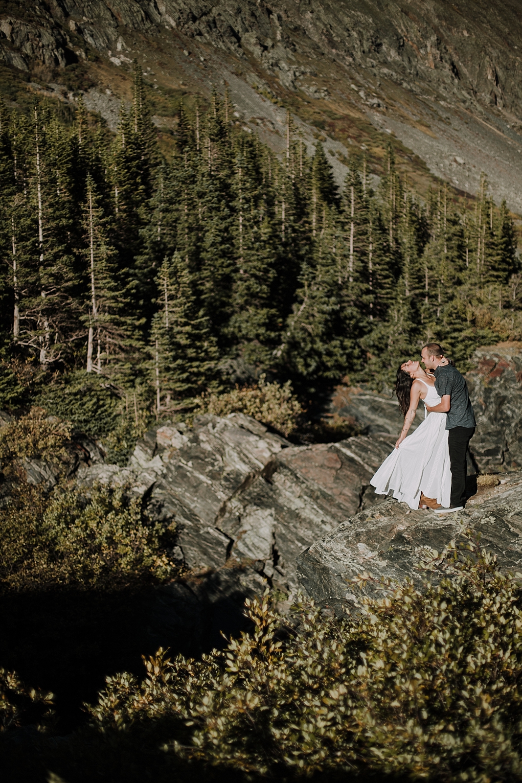 couple posing on cliff, breckenridge colorado wedding photographer, breckenridge colorado elopement photographer, hiking photographer, maui wedding photographer, maui elopement photographer