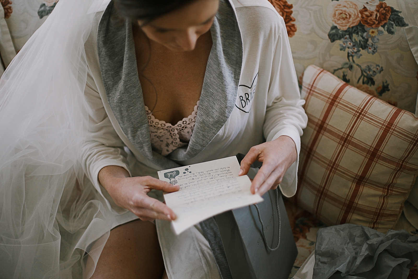 bride reading letter from groom, breckenridge colorado wedding, breckenridge colorado wedding photographer, the church at agape outpost wedding