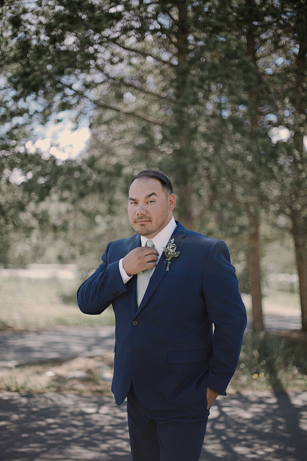 groom posing at agape outpost, breckenridge colorado wedding, breckenridge colorado wedding photographer, the church at agape outpost wedding, agape outpost wedding photographer