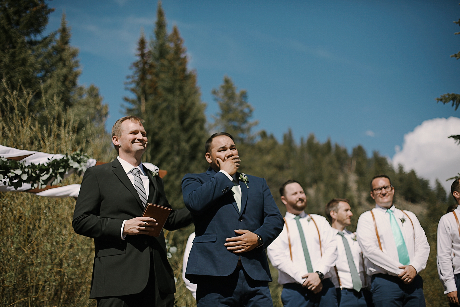 groom crying, groom cries seeing his bride, breckenridge colorado wedding, breckenridge colorado wedding photographer, the church at agape outpost wedding, agape outpost wedding photographer