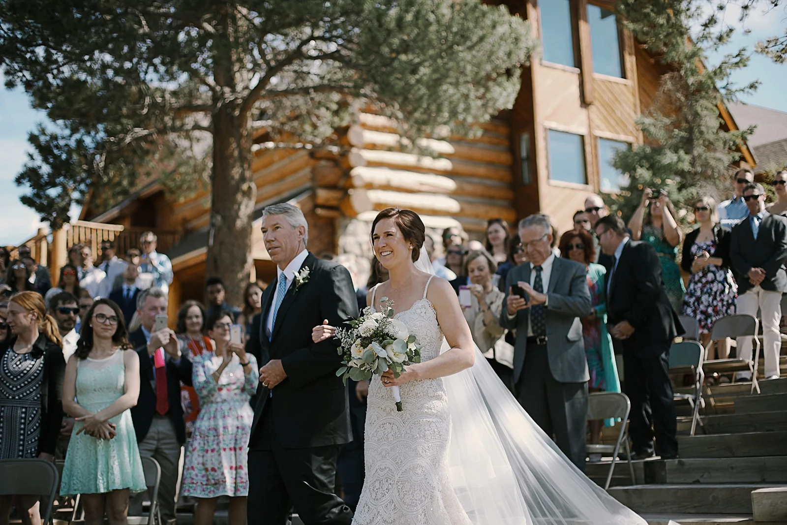 bride walking down the aisle, breckenridge colorado wedding, breckenridge colorado wedding photographer, the church at agape outpost wedding, agape outpost wedding photographer