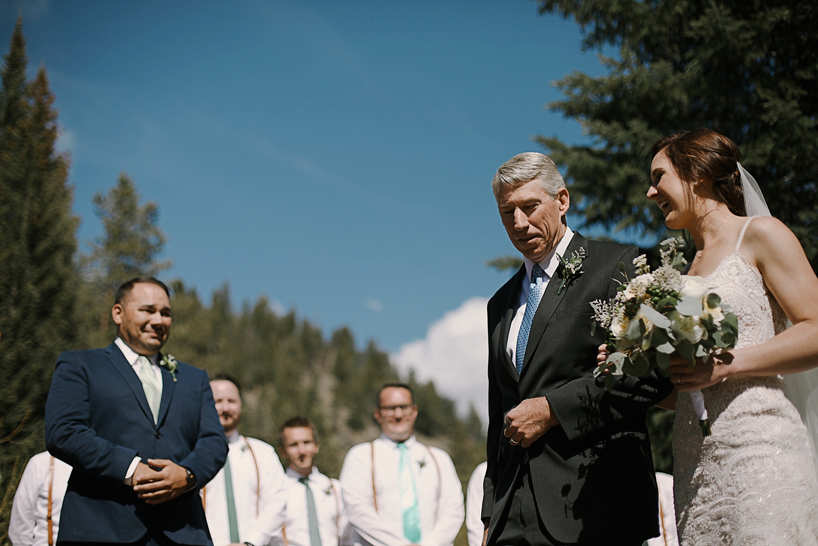 bride walking down the aisle, breckenridge colorado wedding, breckenridge colorado wedding photographer, the church at agape outpost wedding, agape outpost wedding photographer