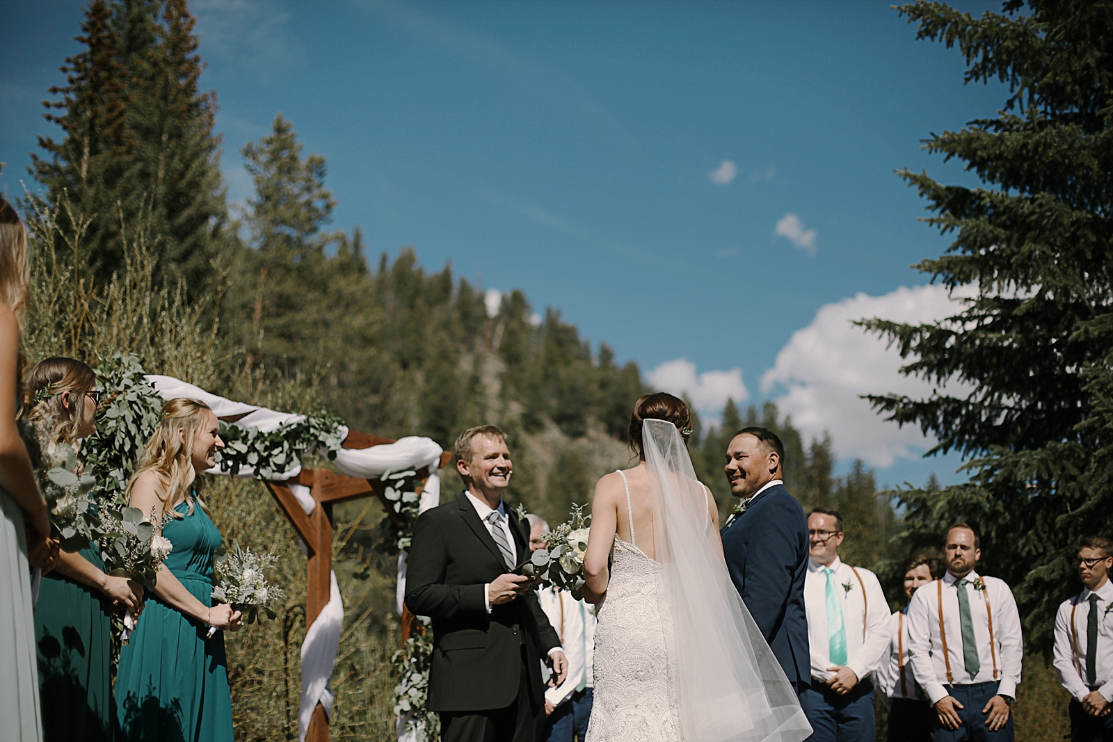 bride and groom saying their vows, breckenridge colorado wedding, breckenridge colorado wedding photographer, the church at agape outpost wedding, agape outpost wedding photographer