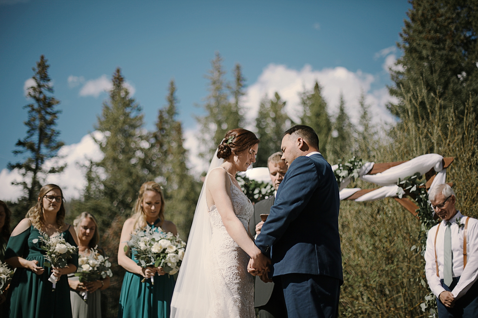 bride and groom saying their vows, breckenridge colorado wedding, breckenridge colorado wedding photographer, the church at agape outpost wedding, agape outpost wedding photographer