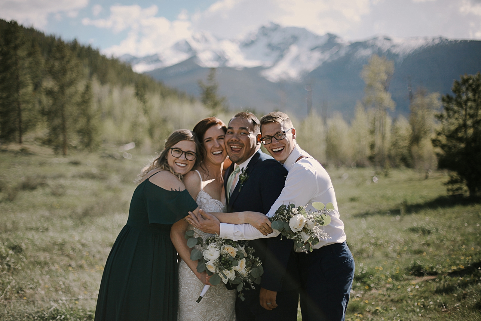 bridal party at agape outpost, the church at agape outpost, breckenridge colorado wedding, breckenridge colorado wedding photographer, agape outpost wedding photographer