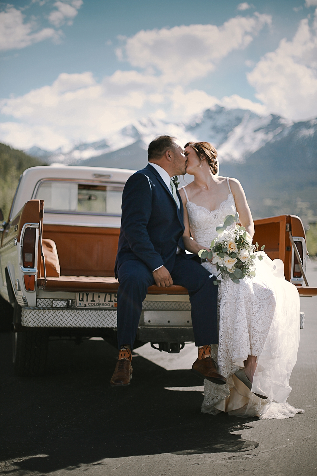 bride and groom in breckenridge colorado, breckenridge colorado wedding, breckenridge colorado wedding photographer, the church at agape outpost wedding, agape outpost wedding photographer
