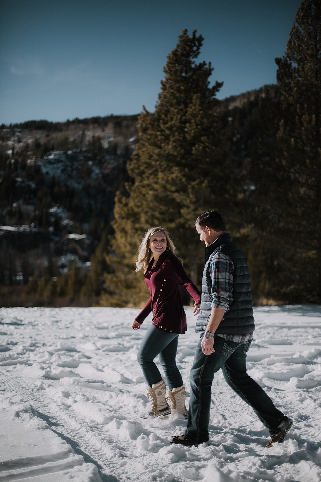 couple walking together, colorado adventure session, colorado engagement session, colorado wedding photographer, leadville wedding photographer, red cliff wedding photographer