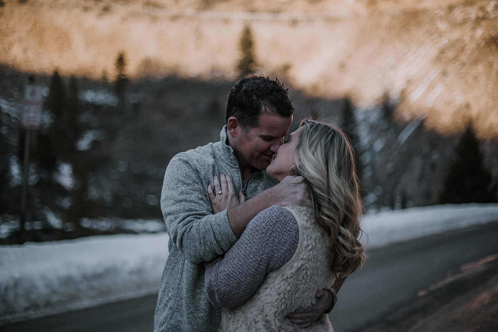 couple kissing, colorado adventure session, colorado engagement session, colorado wedding photographer, red cliff wedding photographer, leadville wedding photographer