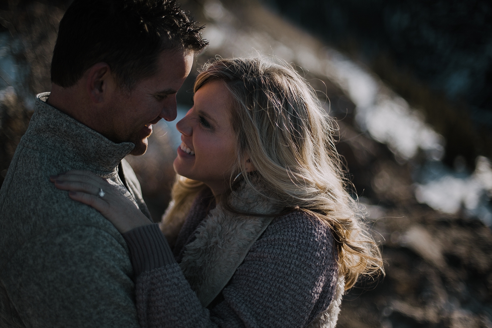 couple on cliffside, adventurous colorado engagements, adventurous colorado wedding photographer, colorado wedding photographer, red cliff wedding photographer, leadville wedding photographer