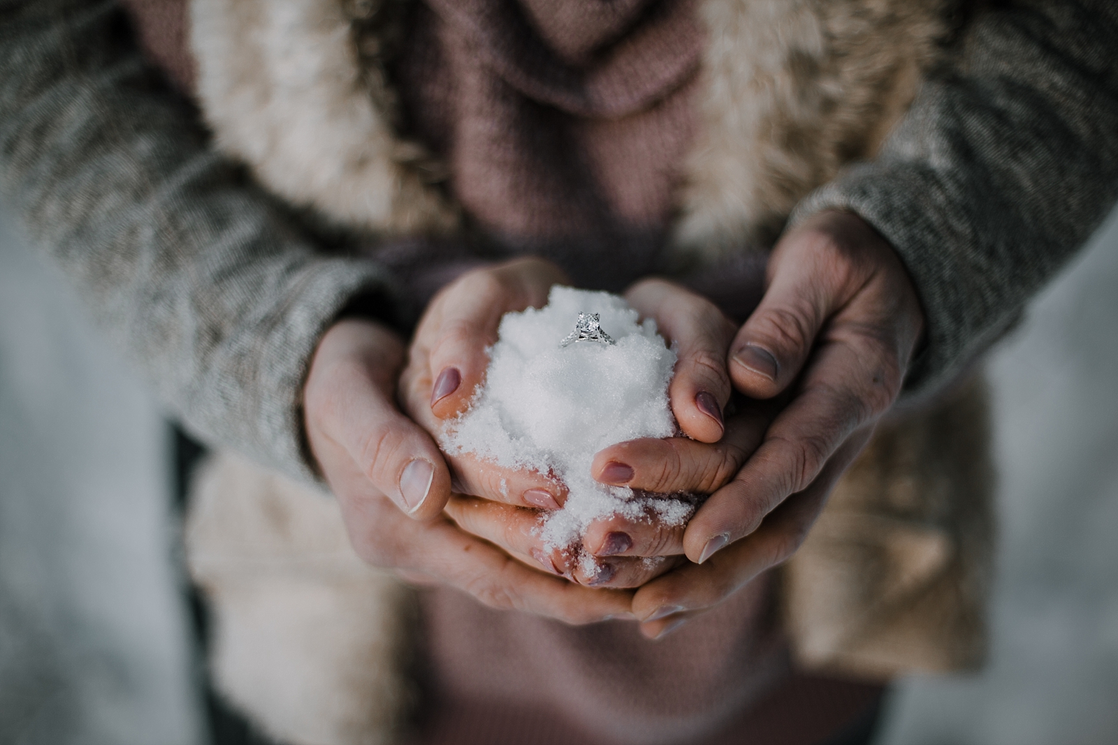 wedding ring in the snow, adventurous colorado engagements, colorado wedding photographer, red cliff wedding photographer, leadville wedding photographer