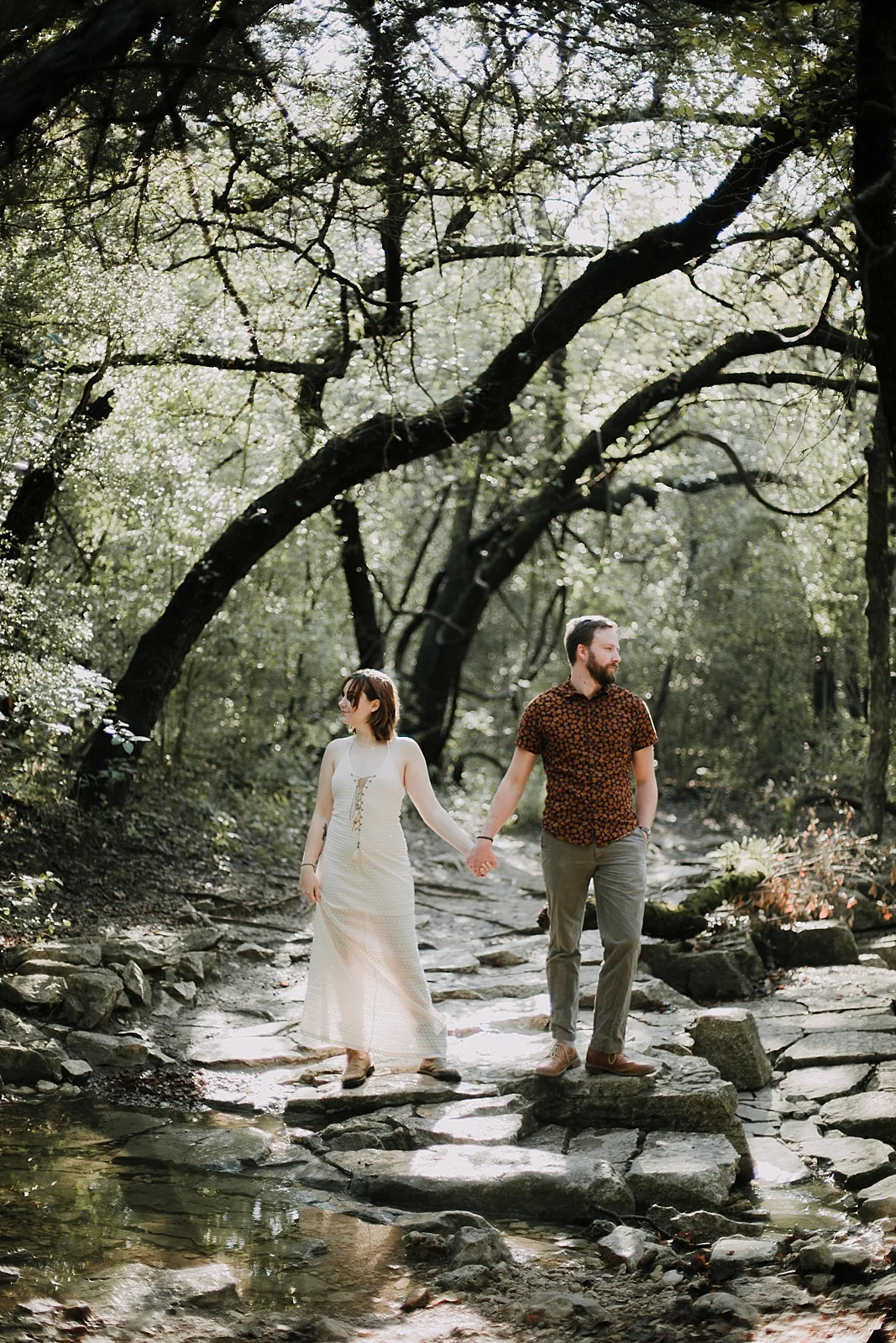couple hiking in the woods, austin texas wedding photographer, paris france wedding photographer, south africa wedding photographer, dripping springs texas wedding photographer