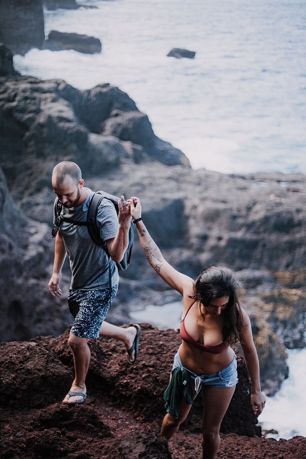 climbing in maui, maui cliffside, maui climbing, maui elopement photographer, maui wedding photographer, couple on cliffside, maui hiking, maui hawaii hiking, maui tide pool, alexis russell ring