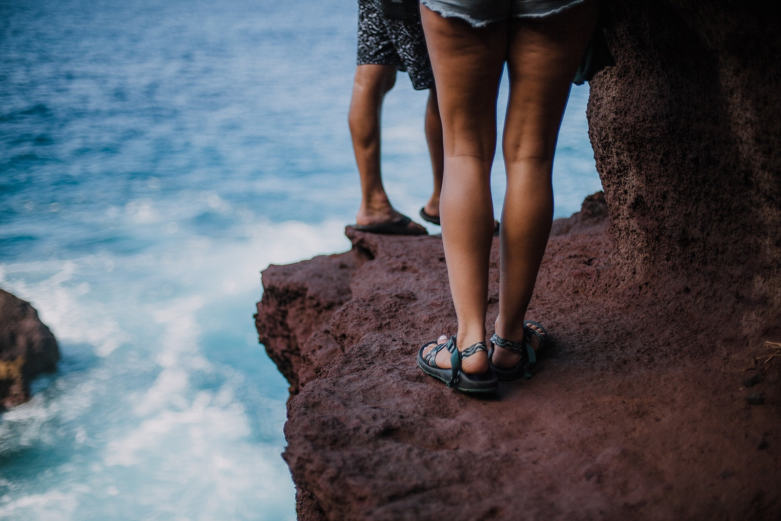 climbing in maui, maui cliffside, maui climbing, maui elopement photographer, maui wedding photographer, couple on cliffside, maui hiking, maui hawaii hiking, maui tide pool, alexis russell ring