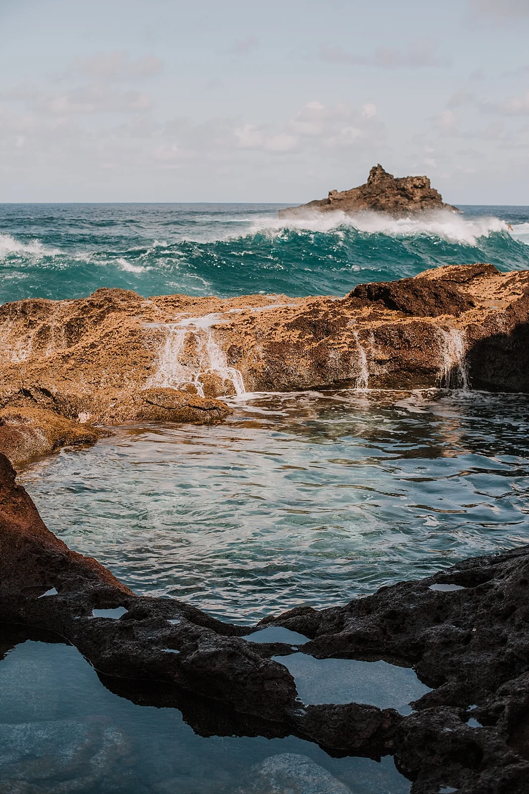 climbing in maui, maui cliffside, maui climbing, maui elopement photographer, maui wedding photographer, couple on cliffside, maui hiking, maui hawaii hiking, maui tide pool, alexis russell ring