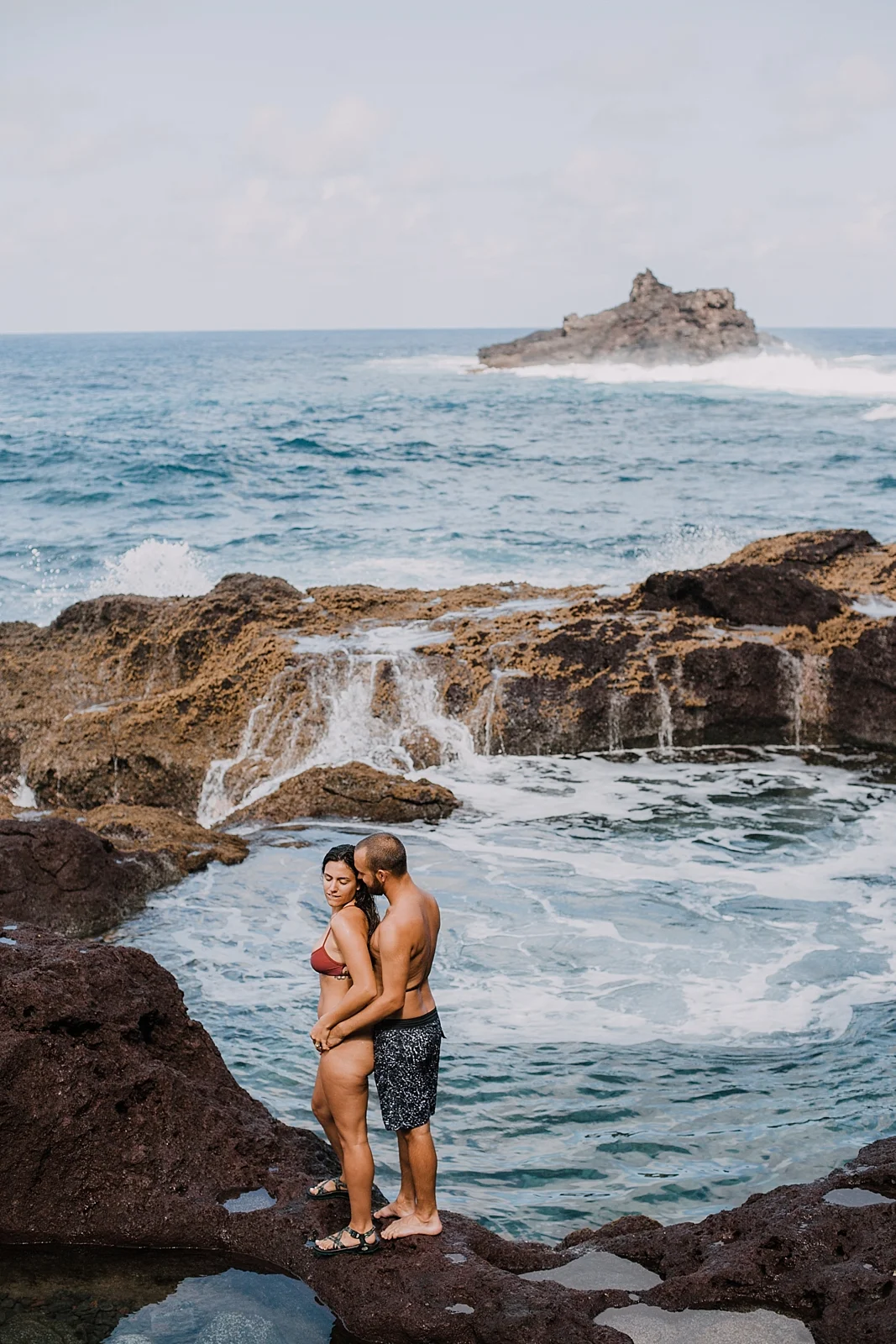 climbing in maui, maui cliffside, maui climbing, maui elopement photographer, maui wedding photographer, couple on cliffside, maui hiking, maui hawaii hiking, lahaina maui beaches, alexis russell ring