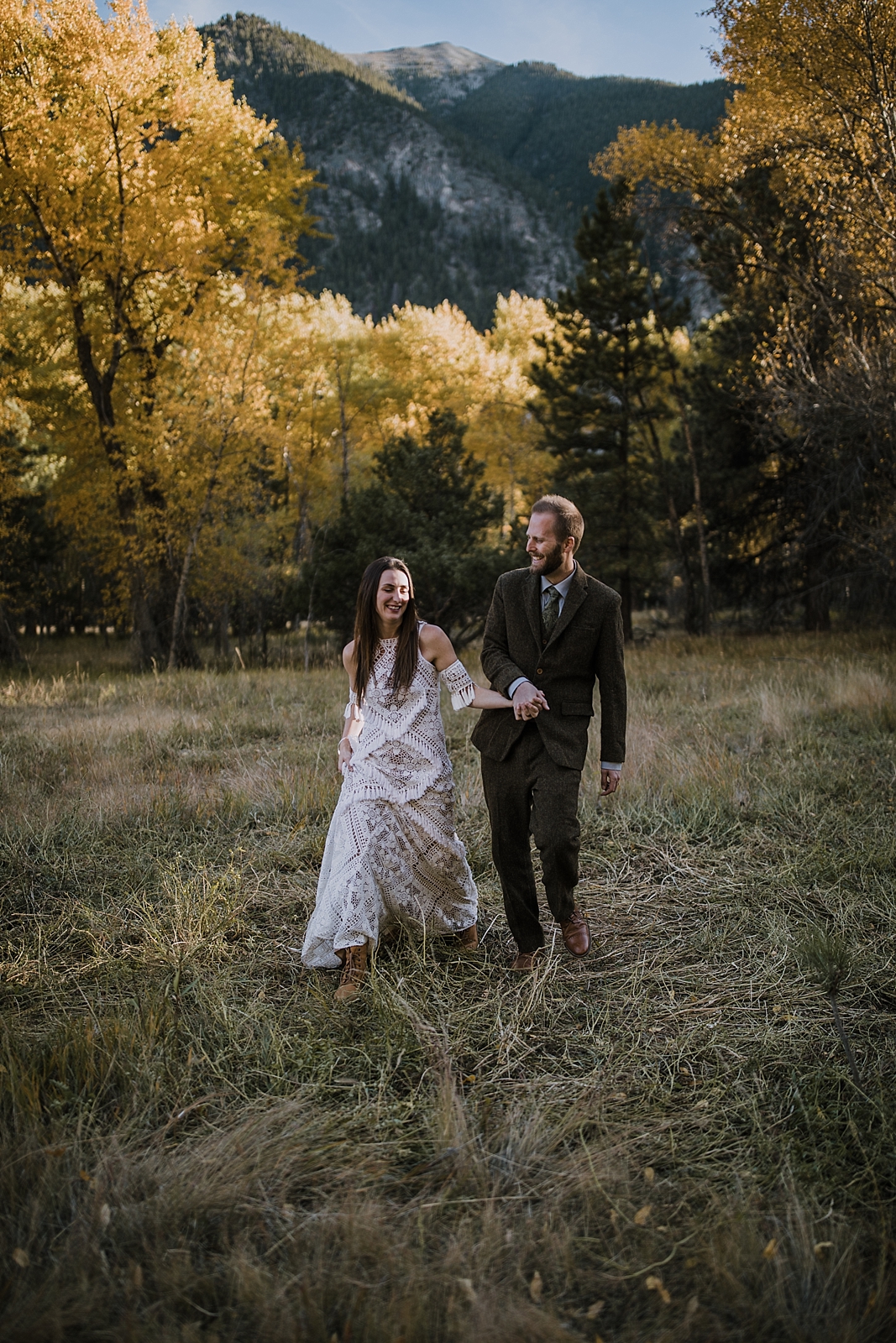 couple walking, norway elopement, post elopement celebration, wedding in the woods, buena vista elopement, buena vista wedding, nathrop colorado wedding, adventurous colorado elopement, farmers market