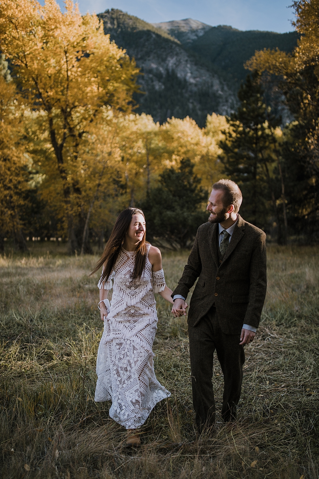 couple walking, norway elopement, post elopement celebration, wedding in the woods, buena vista elopement, buena vista wedding, nathrop colorado wedding, adventurous colorado elopement, farmers market