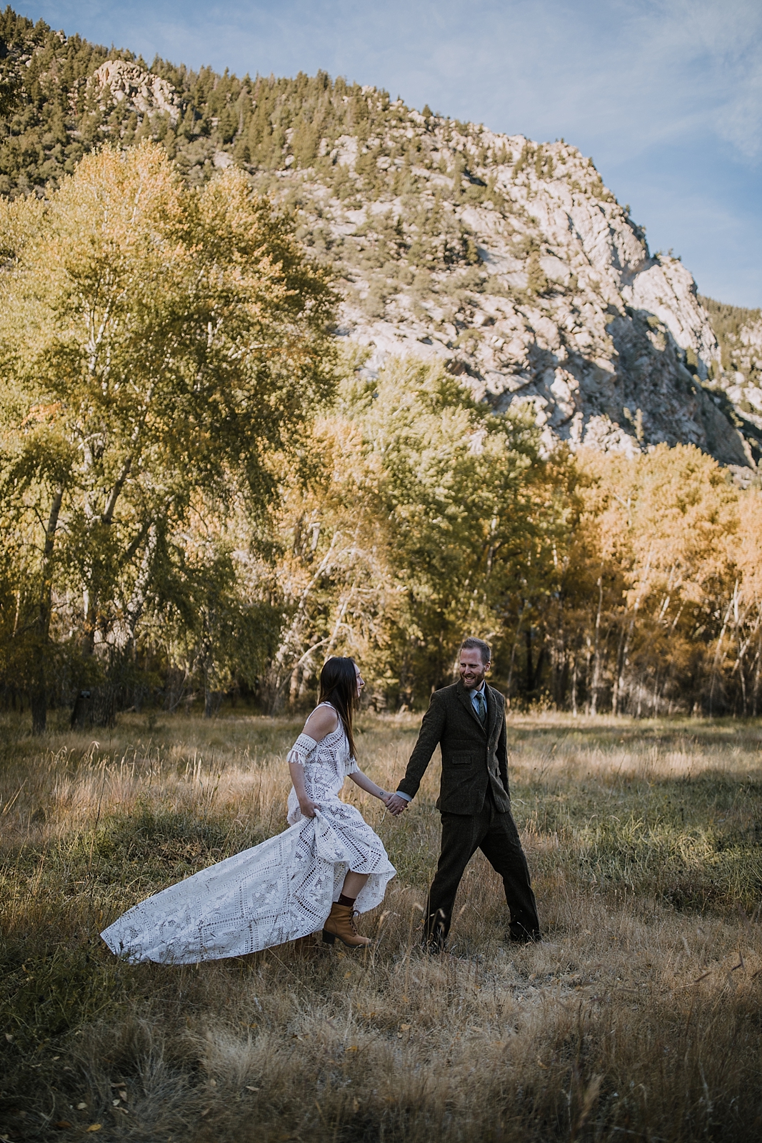 couple walking, norway elopement, post elopement celebration, wedding in the woods, buena vista elopement, buena vista wedding, nathrop colorado wedding, adventurous colorado elopement, farmers market