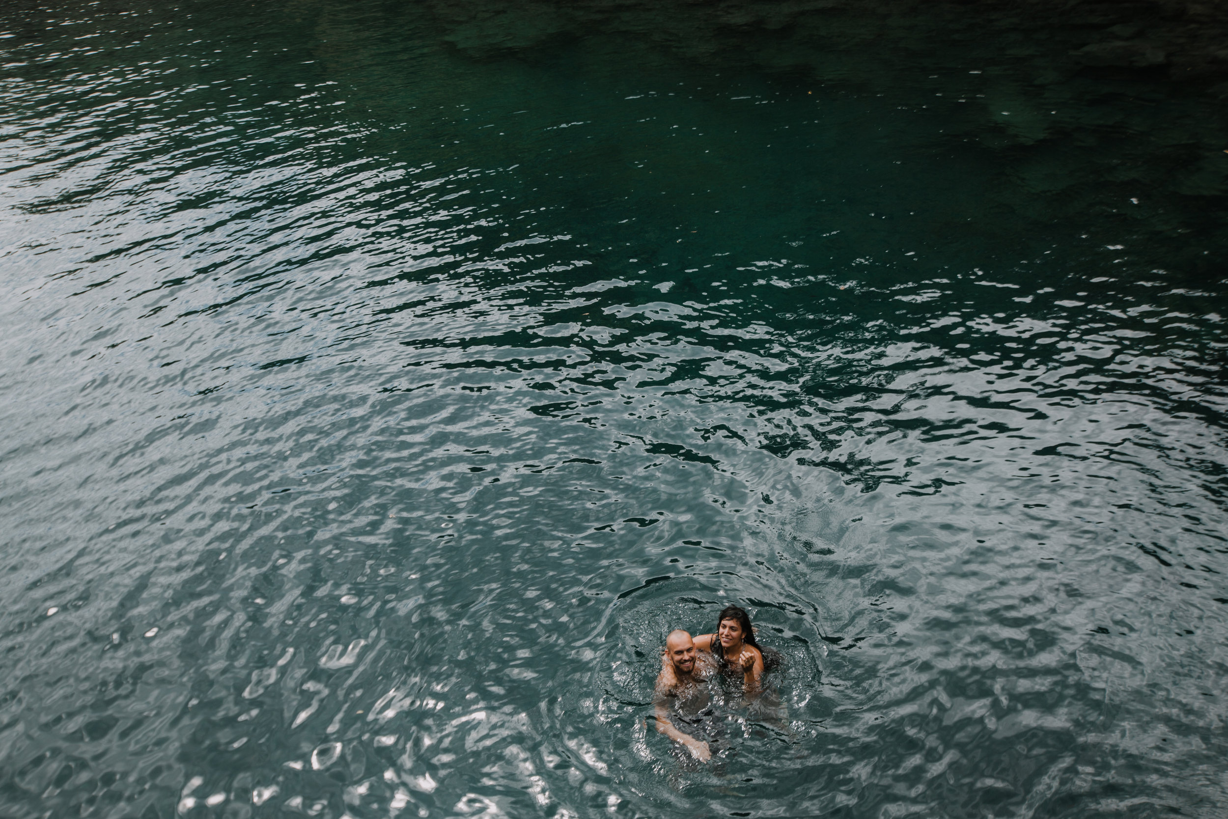 couple swimming, seven sacred pools at ohe'o, island hiking, road to hana, hawaii wedding photographer, hawaii elopement photographer, maui wedding, maui engagements, maui elopement