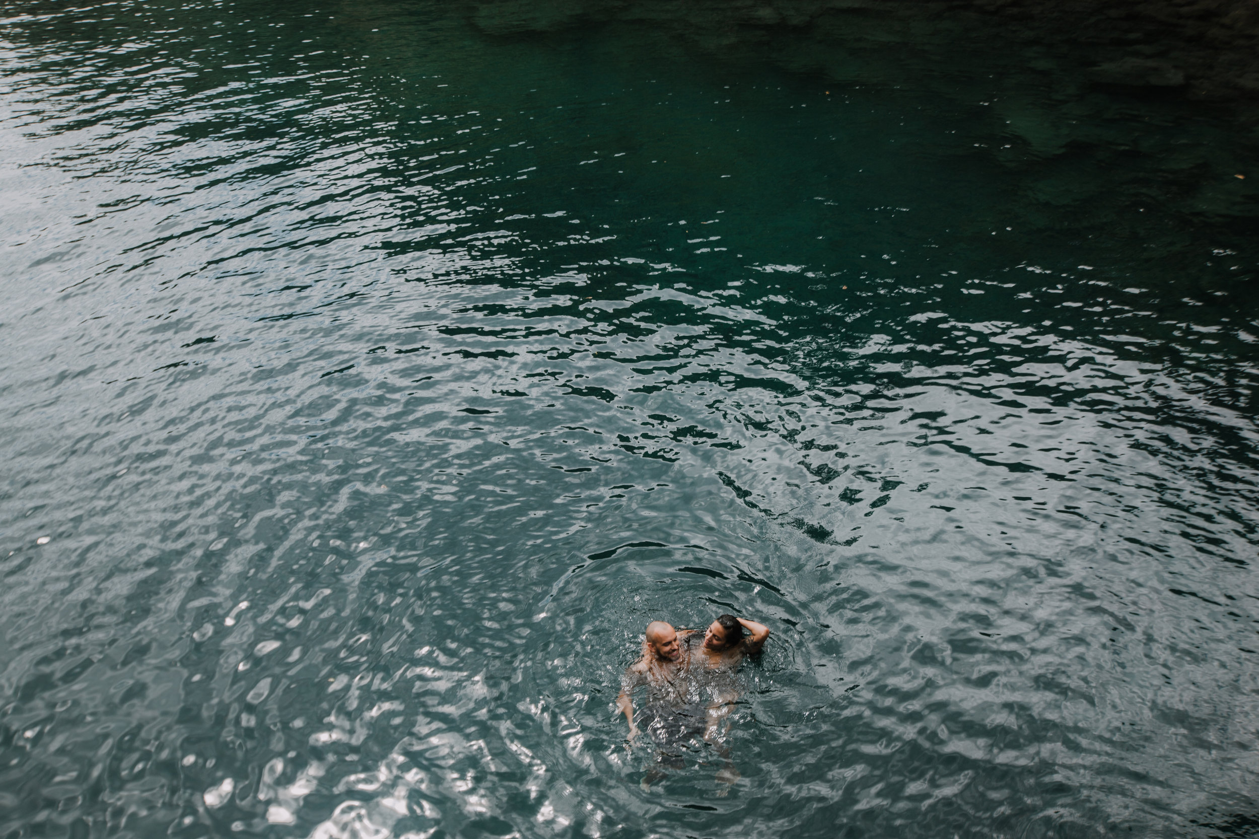 couple swimming, seven sacred pools at ohe'o, island hiking, road to hana, hawaii wedding photographer, hawaii elopement photographer, maui wedding, hana swimming, maui engagements, maui elopement