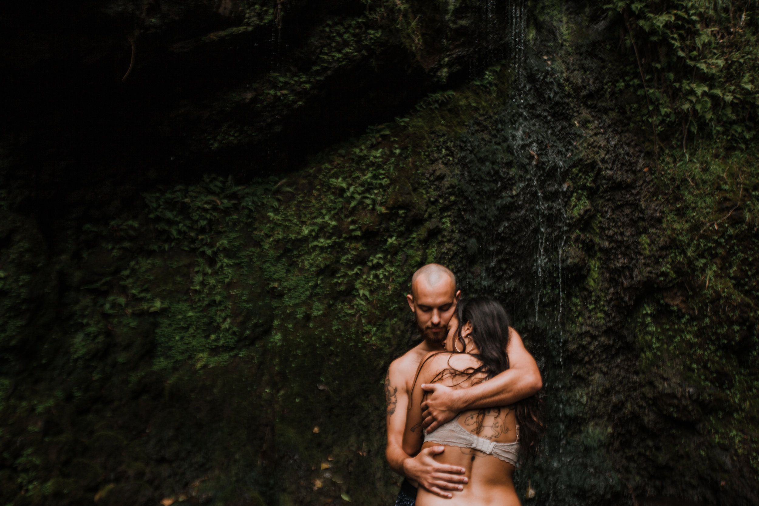 couple hugging, hana maui waterfall, hawaii waterfall, road to hana, maui waterfall, hawaii wedding photographer, hawaii elopement photographer, maui wedding, maui engagements, maui elopement