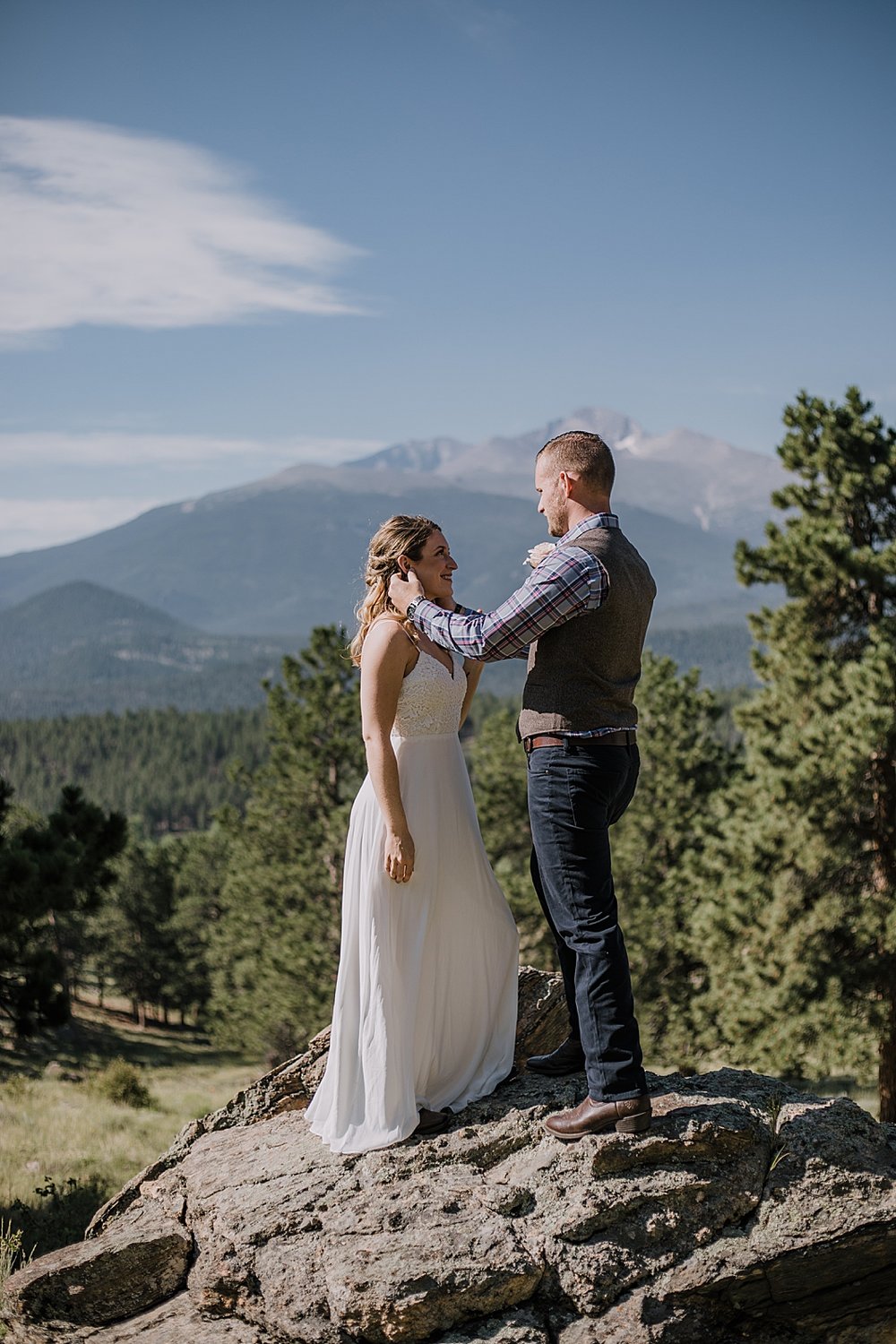 couple in front of long's peak, rocky mountain national park elopement, 3M curves elopement, self solemnizing, self solemnization, long's peak ceremony, hiking elopement, estes park elopement