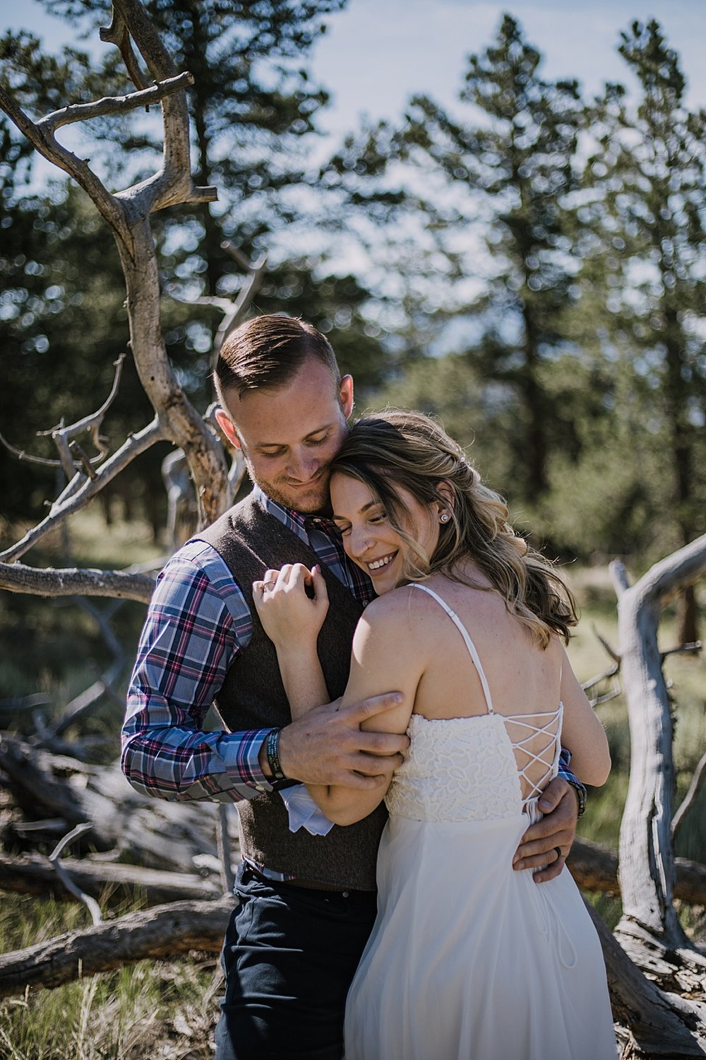 couple cuddling, RMNP elopement ceremony, rocky mountain national park elopement, 3M curves elopement, self solemnizing, self solemnization, long's peak, summer hiking elopement, estes park elopement