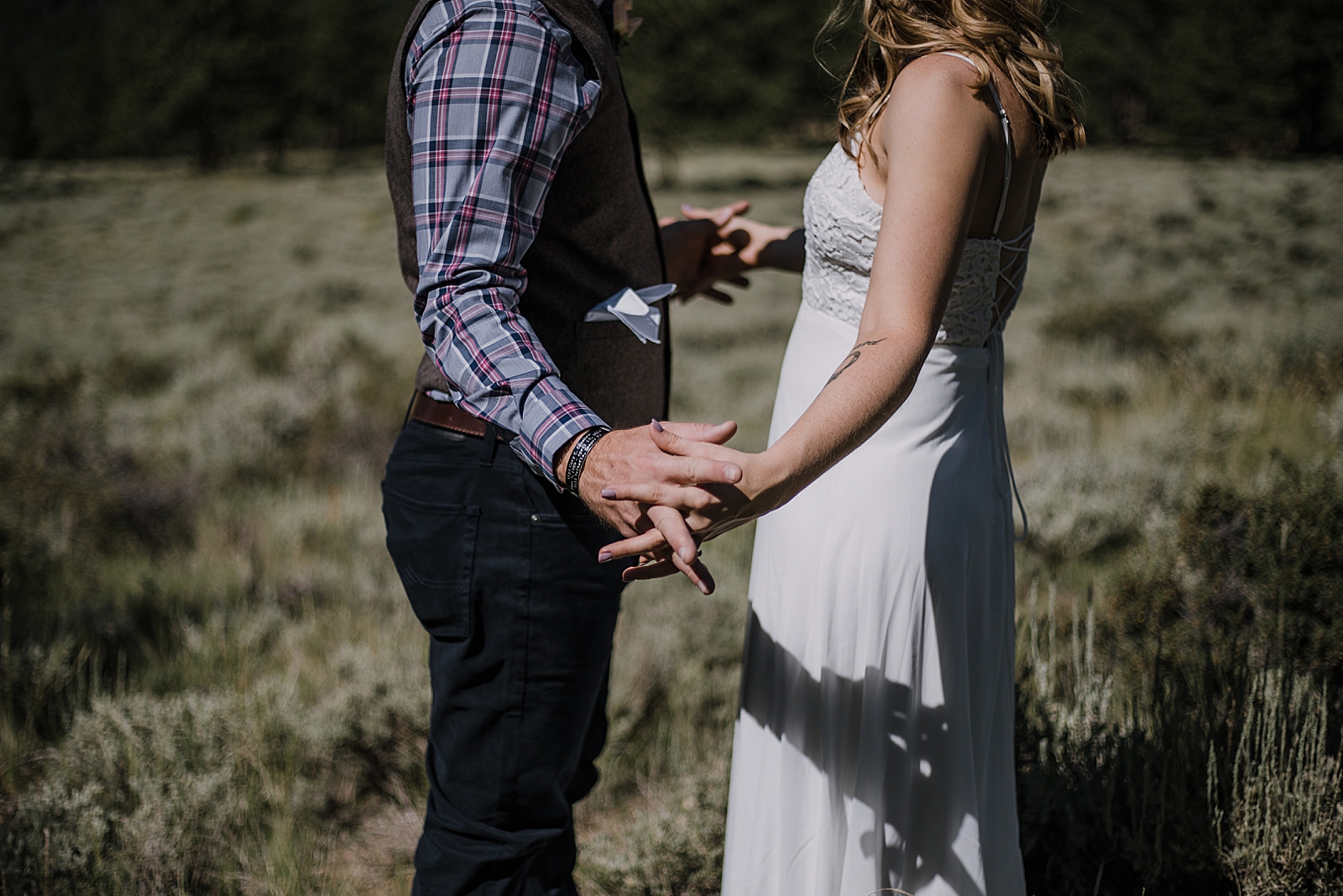 couple hands, RMNP elopement ceremony, rocky mountain national park elopement, 3M curves elopement, self solemnizing, self solemnization, long's peak, summer hiking elopement, estes park elopement