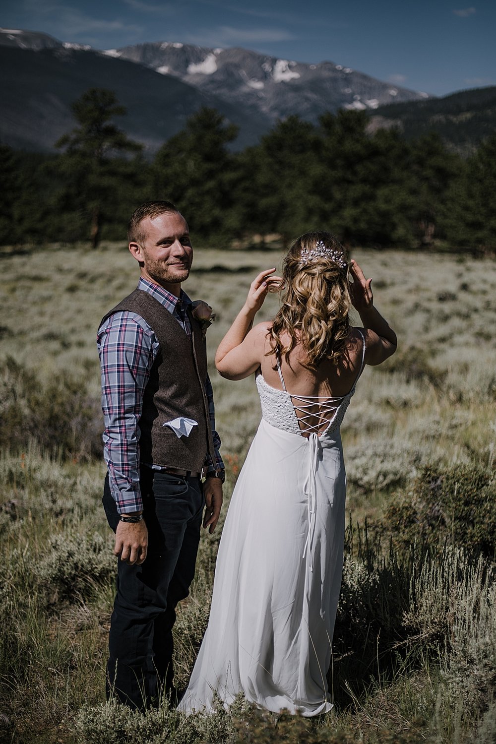 groom laughing, RMNP elopement ceremony, rocky mountain national park elopement, 3M curves elopement, self solemnizing, self solemnization, long's peak, summer elopement, estes park elopement
