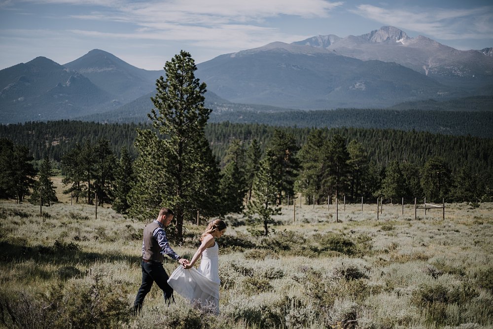 groom and bride hiking, RMNP elopement ceremony, rocky mountain national park elopement, 3M curves elopement, self solemnizing, self solemnization, long's peak, summer elopement, estes park elopement