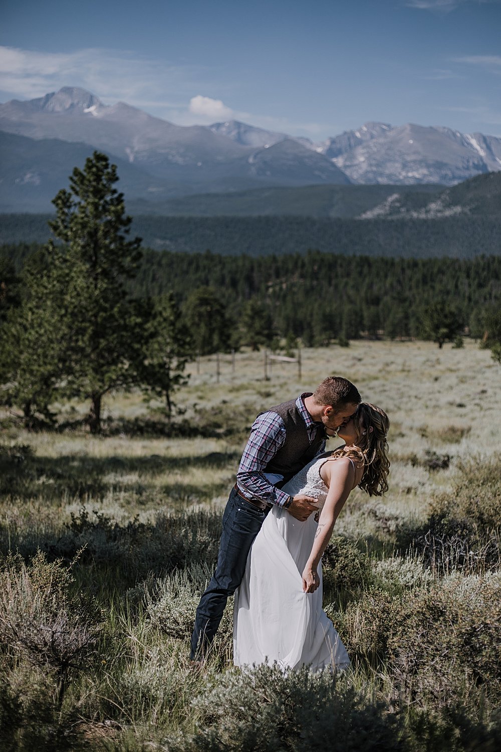 bride and groom dancing, RMNP elopement ceremony, rocky mountain national park elopement, 3M curves elopement, self solemnizing, self solemnization, long's peak, summer elopement, estes park elopement