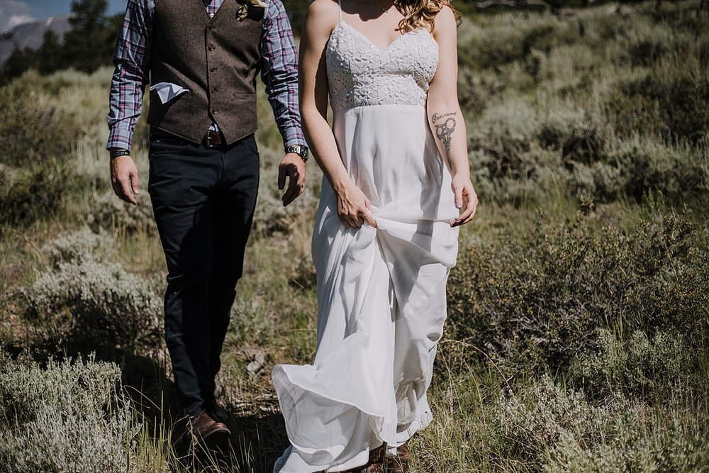 bride and groom hiking, RMNP elopement ceremony, rocky mountain national park elopement, 3M curves elopement, self solemnizing, self solemnization, long's peak, summer elopement, estes park elopement