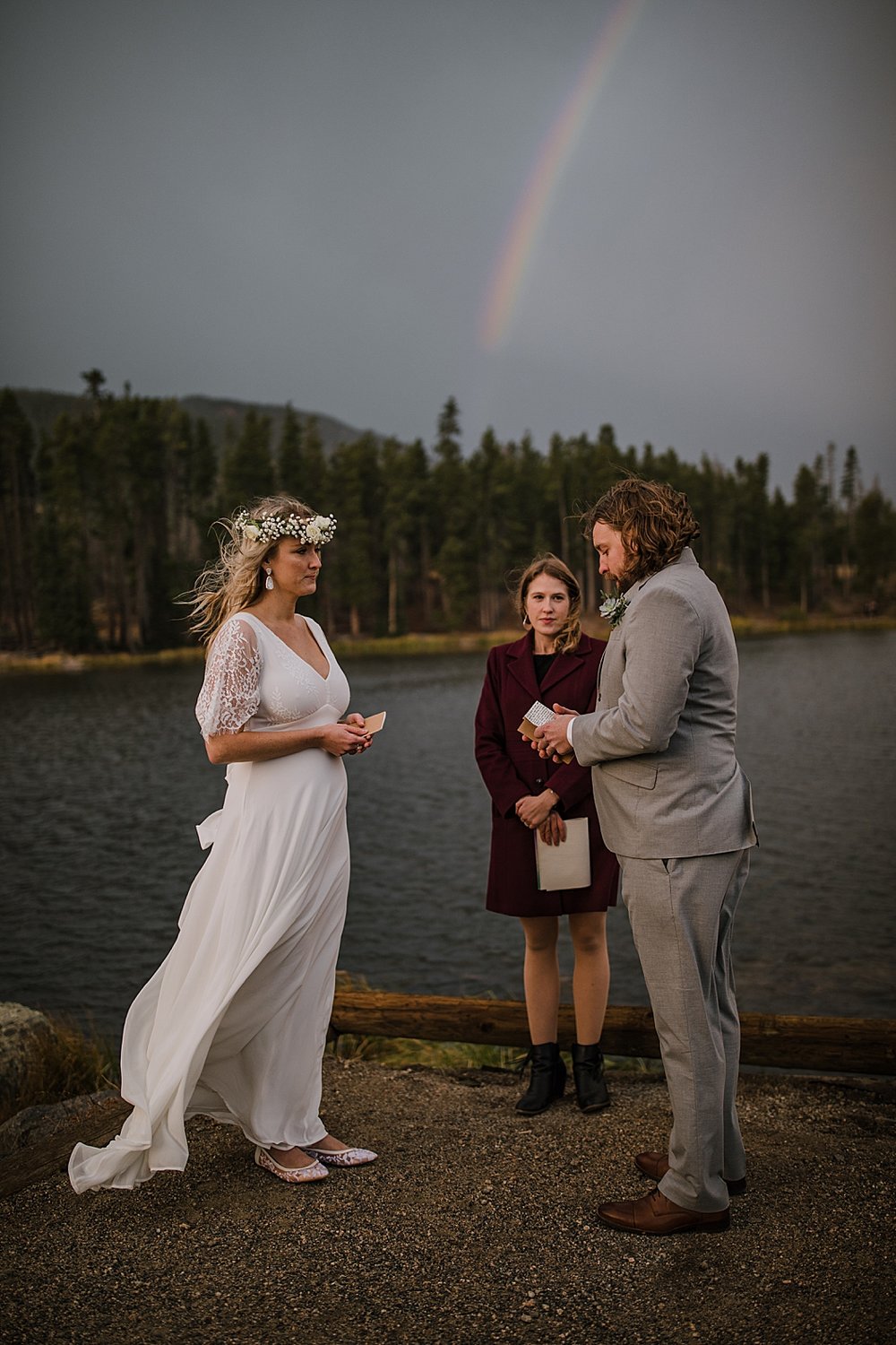 bride and groom vows, sprague lake dock elopement, sunrise elopement, colorado elopement, sprague lake elopement, rocky mountain national park elopement, adventurous colorado hiking elopement